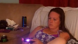 I lift up my micro minidress and show off my panties and spread my legs on couch while playing games