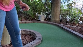 Pretty girl golfing and she completely miss the shot