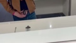 Showing off my chastity cage at the airport