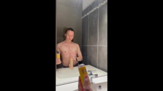 Gym girl playing with her big dildo under the shower