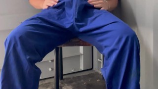 Farm boy in overalls plays at work