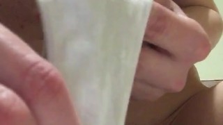 Masturbation of excited pussy through white panties close-up