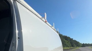 Checking why back van door rattling. Side of the road. Naked.