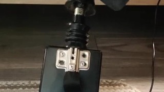 Giving a footjob in my strappy heels to a black cock on my fuck machine