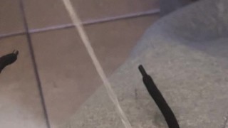 taking a long piss with a boner