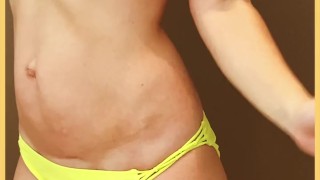 Wifey wears a skimpy yellow bikini